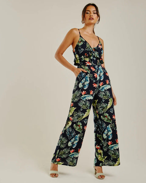 Dusty pink tropical print ruffled jumpsuit