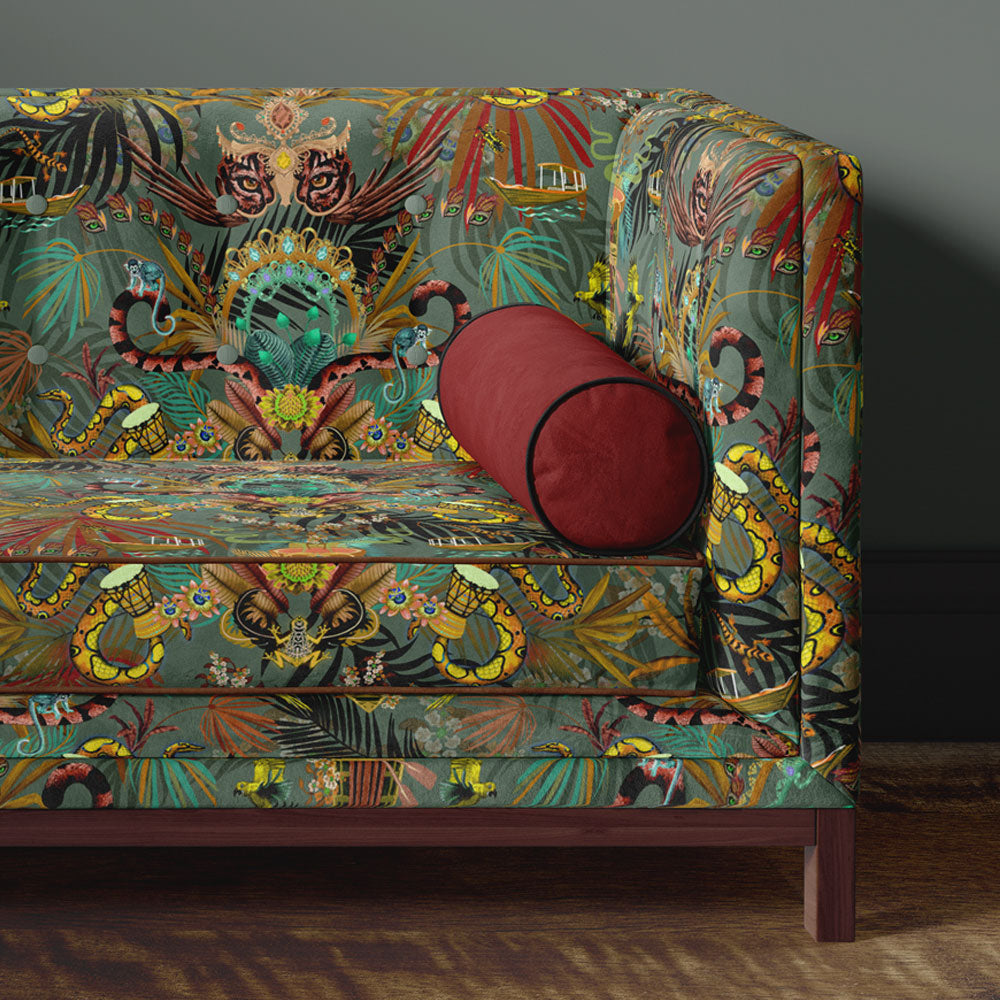 Designer Upholstery Fabric, Amazon Trip Velvet in Jade by Becca Who on sofa