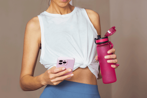 Woman holding a bottle of water