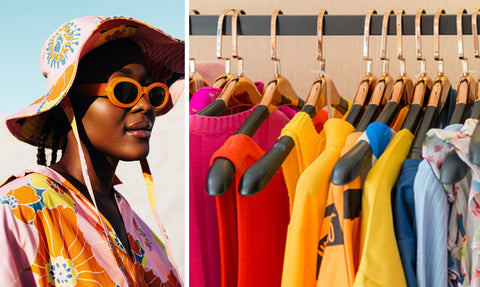 Woman in bright clothes, hat, and sunglasses and rack of bright fashion clothes