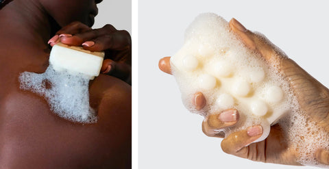Person lathering with raw sugar bar soap