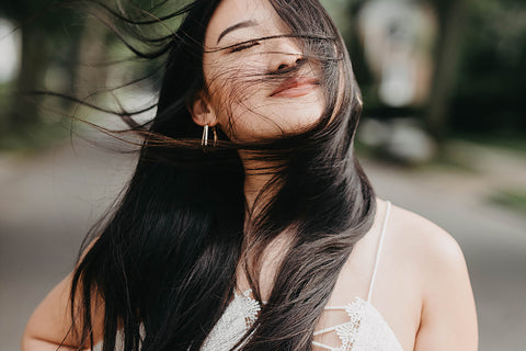 girl with hair blowing in wind