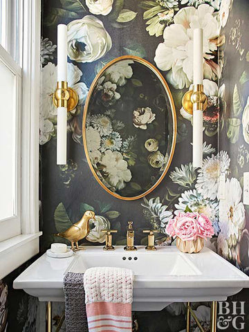 Floral wallpapered bathroom.