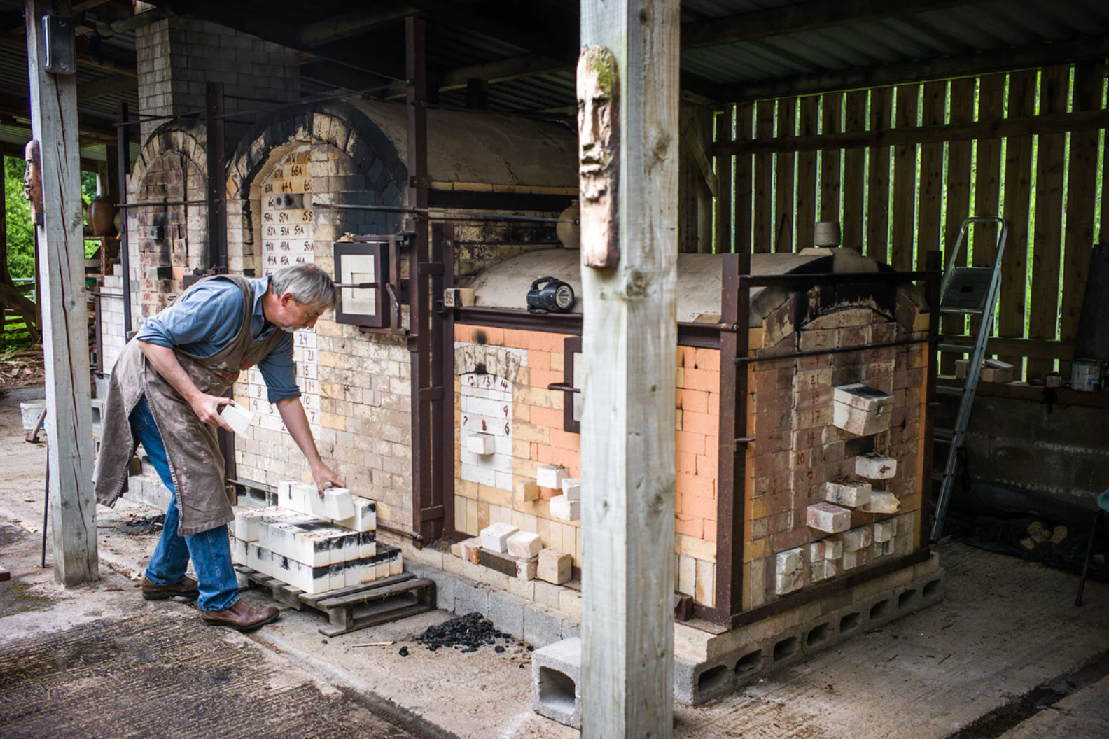 Phil's two-chamber wood-kiln being unpacked