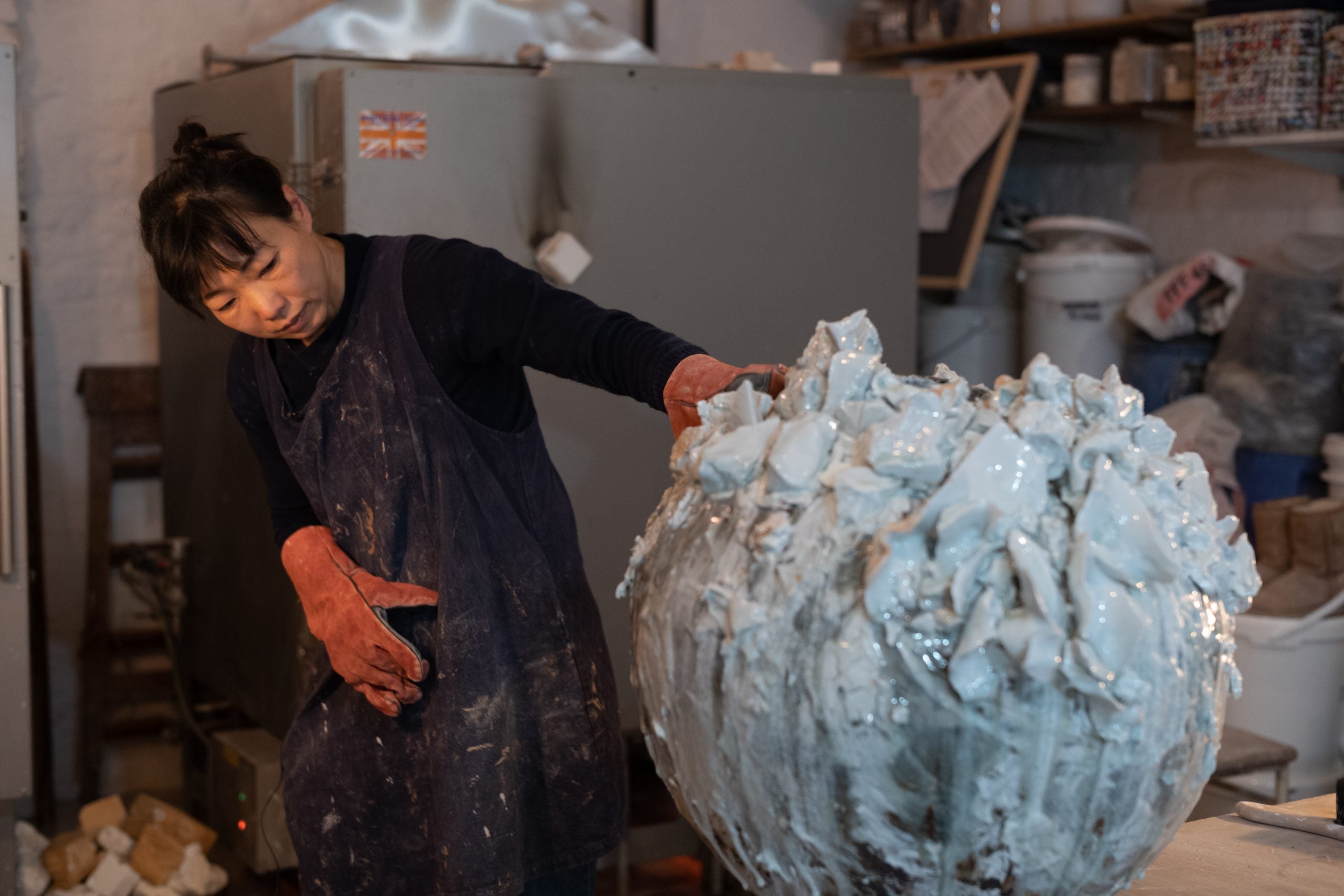 Akiko Hirai with a finished Large Moon Jar, photo Jay Goldmark