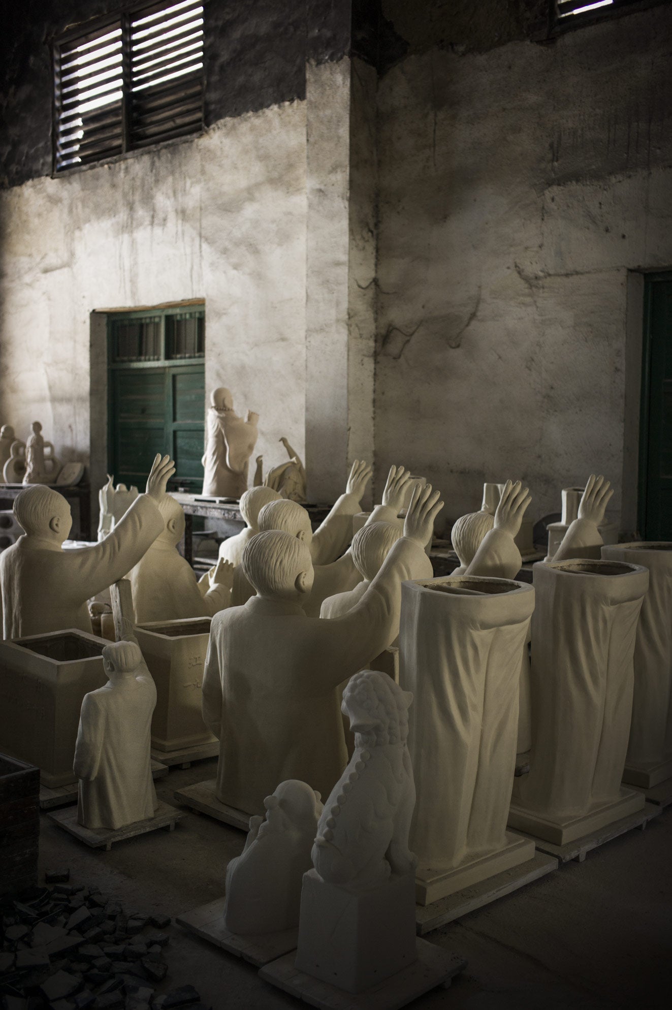 Moulded Mao-morabilia in a Jingdezhen warehouse