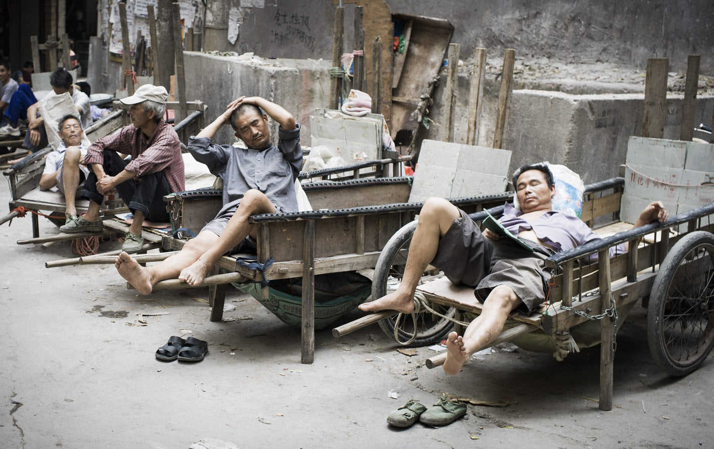Exhausted porters enjoying a well-deserved break
