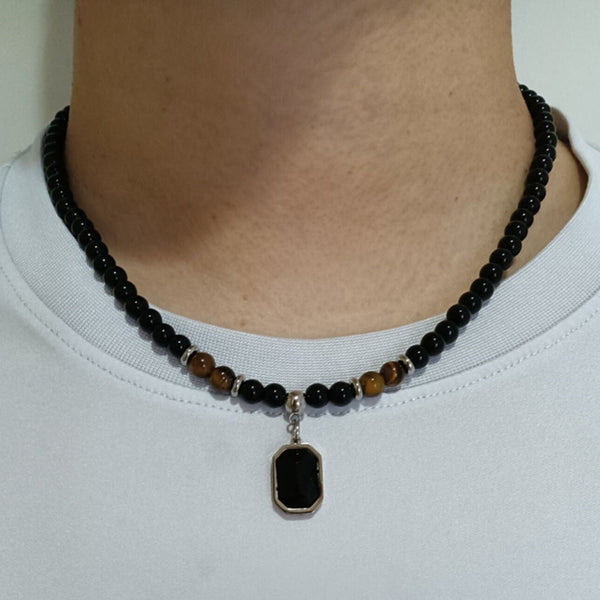 colar de proteção, amuleto de proteção, pedra obsidiana, pedra de proteção, olho de tigre, equilíbrio emocional, segurança, confiança, pedras naturais, colar de pedras naturais, colar protetor, colar de olho de tigre, colar de obsidiana negra