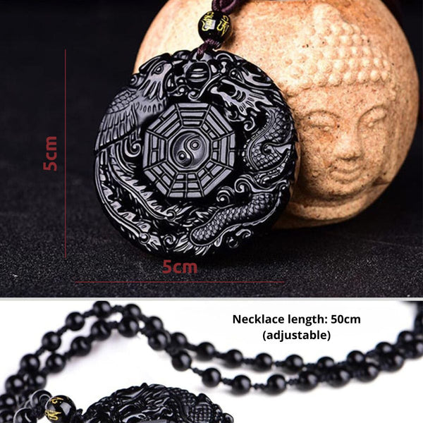 Black obsidian pendant with Yin-Yang in the center and areas of Bagua