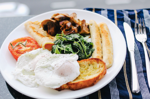 Healthy balanced breakfast of eggs, toast, and more