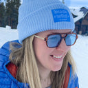 Girl with sunglasses on wearing the Buck Wild Beanie 