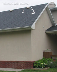 Radon system pipe running through roof. Radon Solutions Kansas installation.