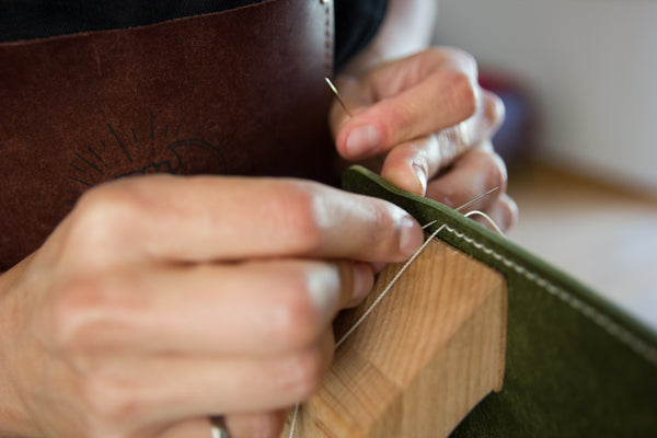 Leather hand-sewn, stitched by hand with the traditional saddle stitching method