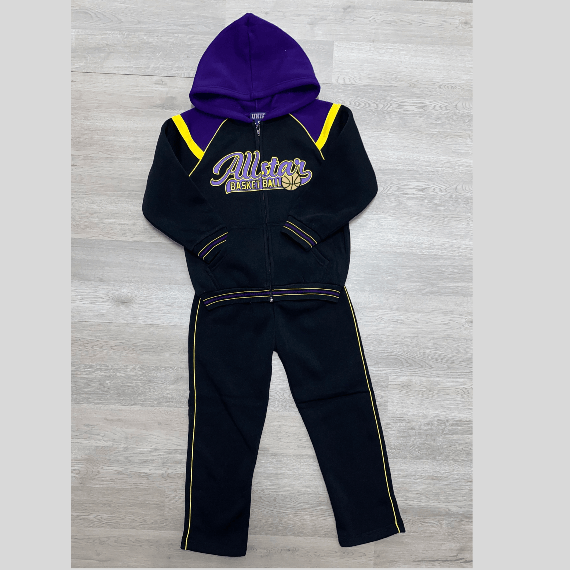 Keep your All-Star feeling and looking like an All-Star in this warm fleece sweat suit.  This black sweat suit features the words "All-Star" and a basketball embroidered on the front.  This sweat suit is perfect for the little baller in your life.