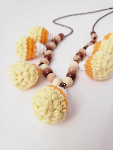 Crochet candy corn necklace with sooden beads