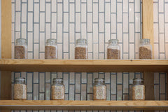 Jars of Roasted Coffee Beans on Shelves