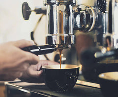 Person making espresso