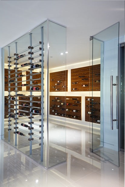 The large glass door opens to this unbelievable, large, contemporary wine room