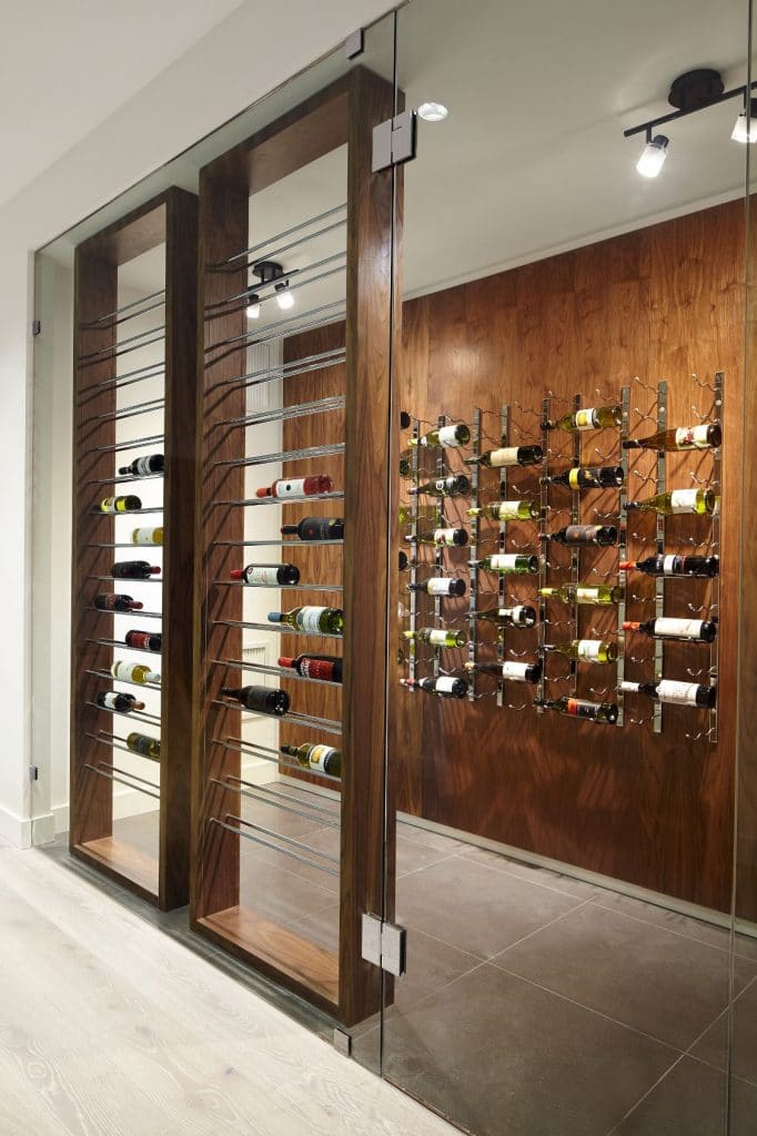 Modern Metal Wine Racks Mounted to Millwork Clad Wall