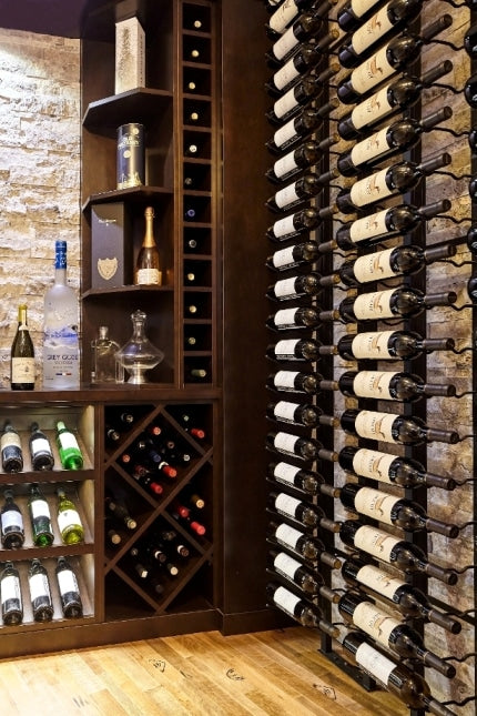 Metal Wine Racks on the Right Wall with bottles.