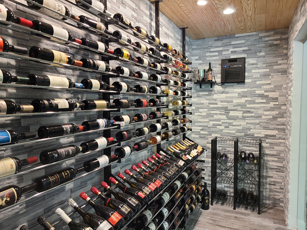 Evolution Wine Racks Mounted Floor-to-Ceiling in Front of a Rock Wall
