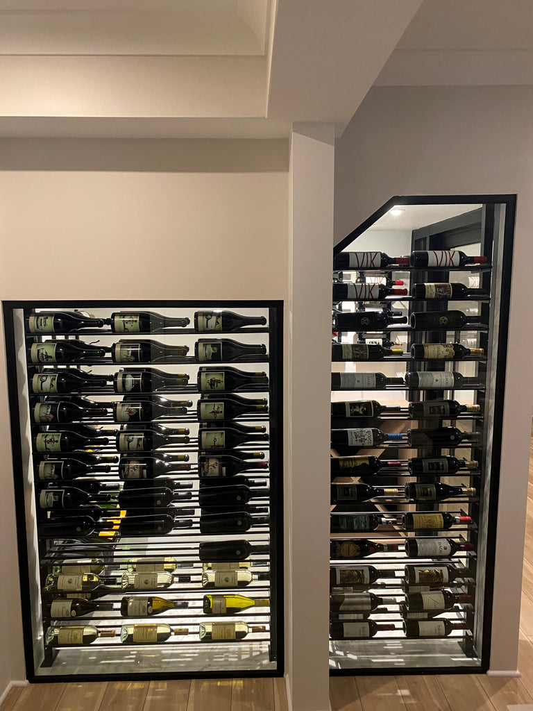 Evolution Wine Racks Mounted Under Stairs in Front of a Glass Wall