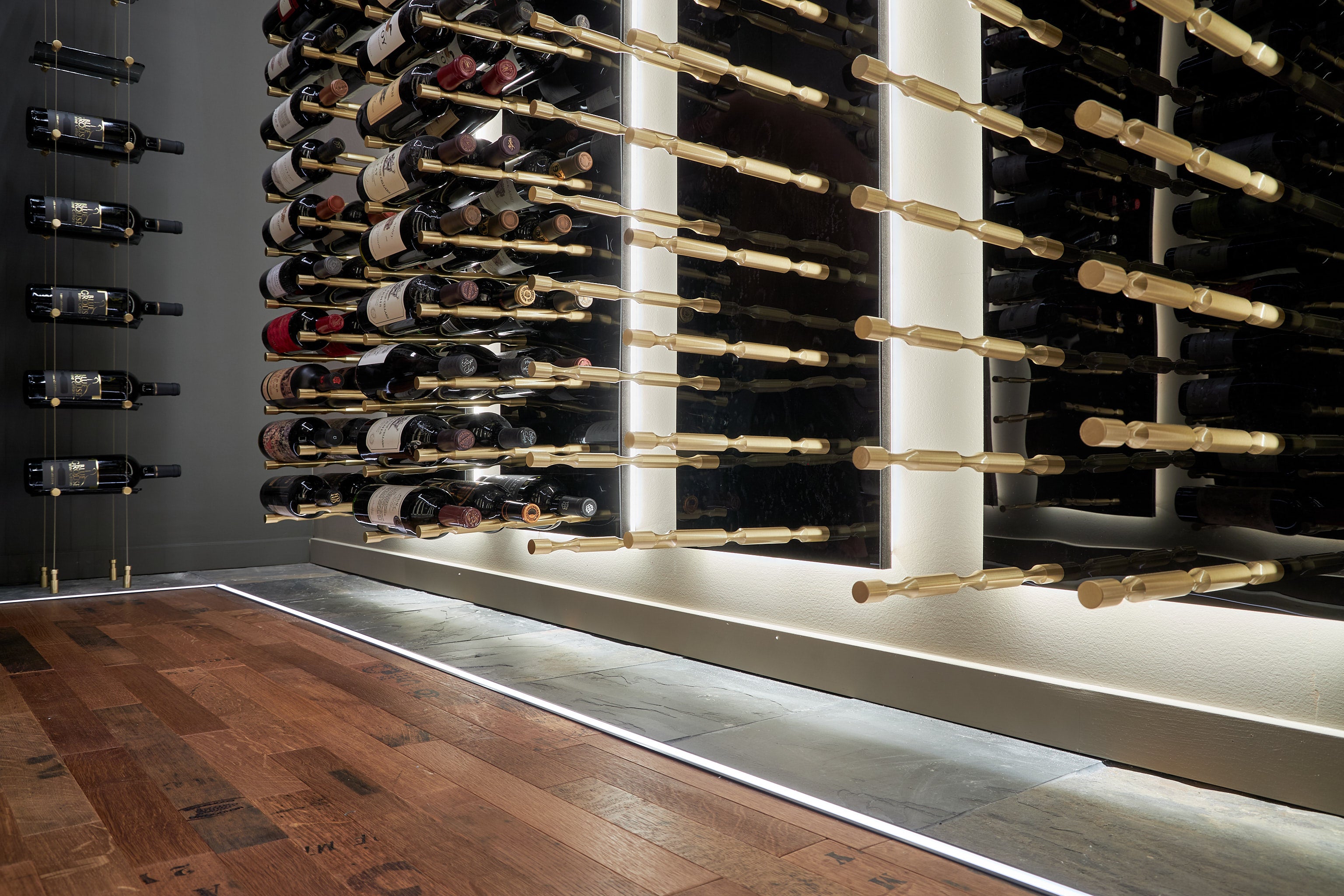 Modern Wine Cellar with Gold Hardware