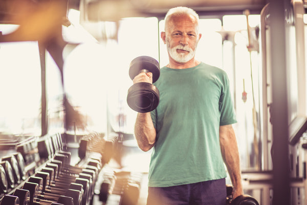 man lifting weights