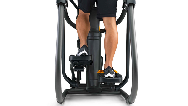 legs of person on elliptical