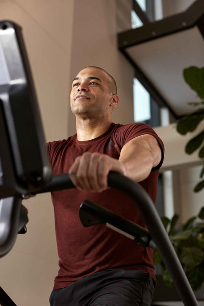 man using a stair climber