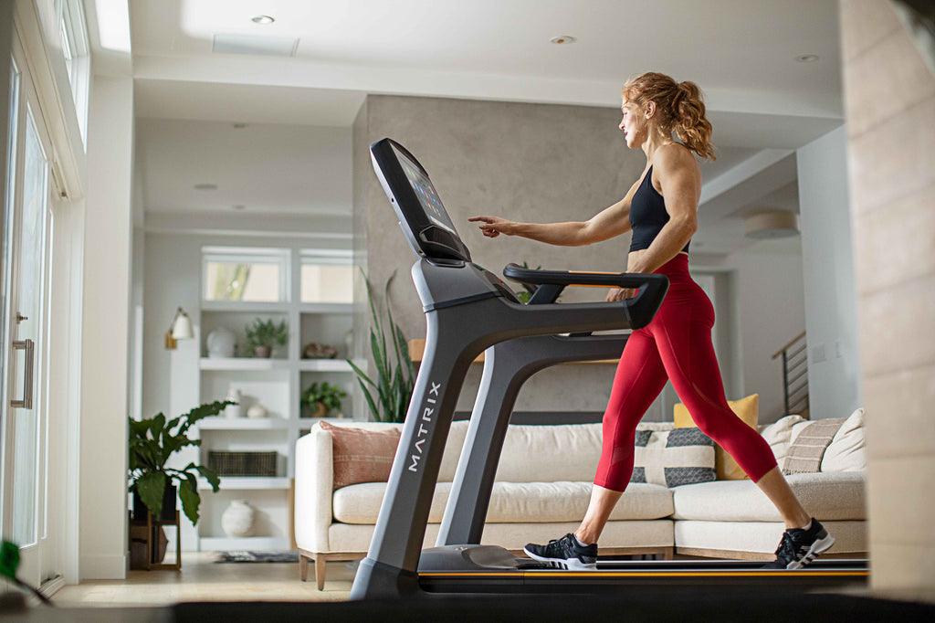 woman walking on a treadmill