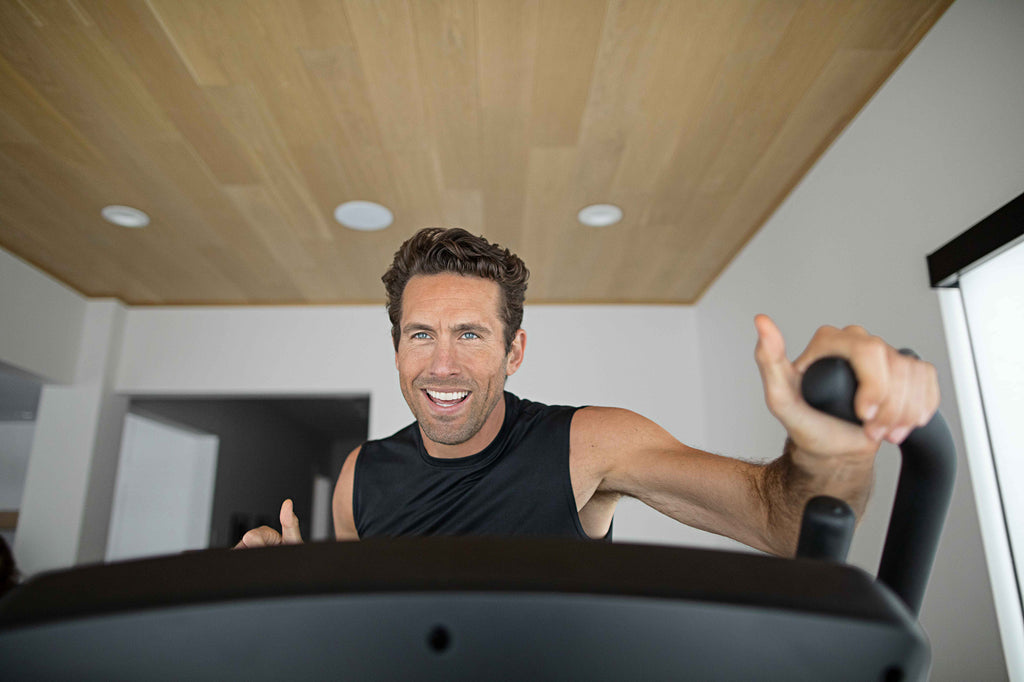 man using elliptical