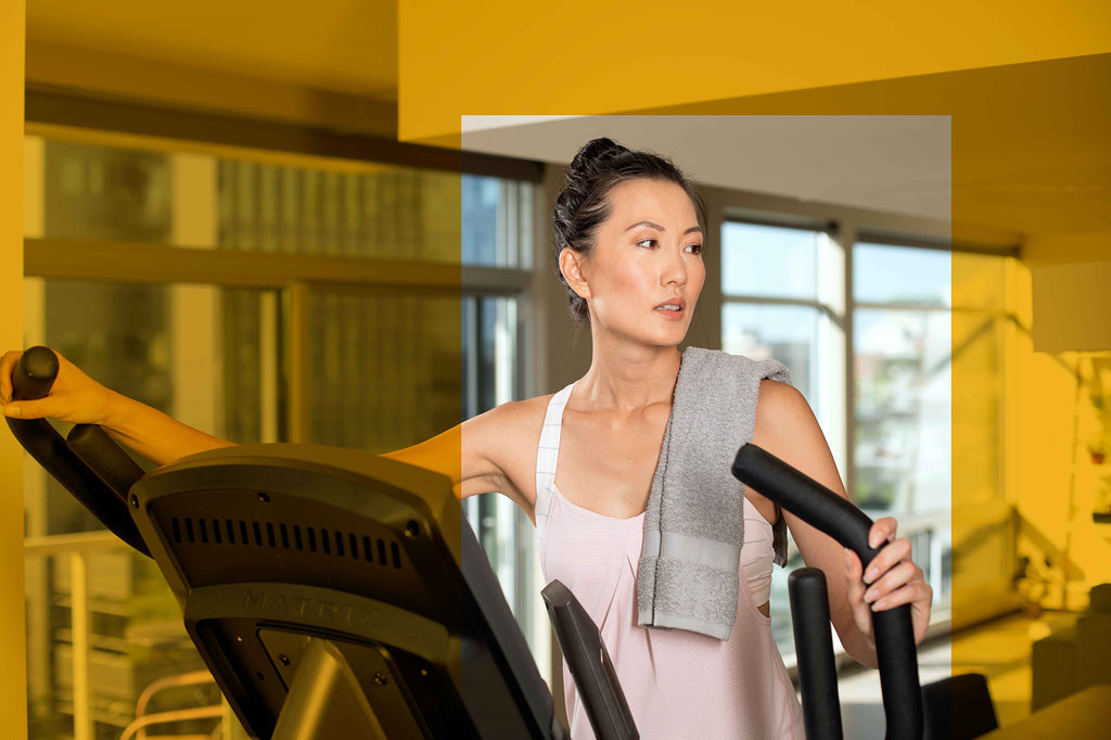 woman on an elliptical, just torso and head
