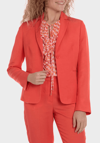 Women wearing red blazer