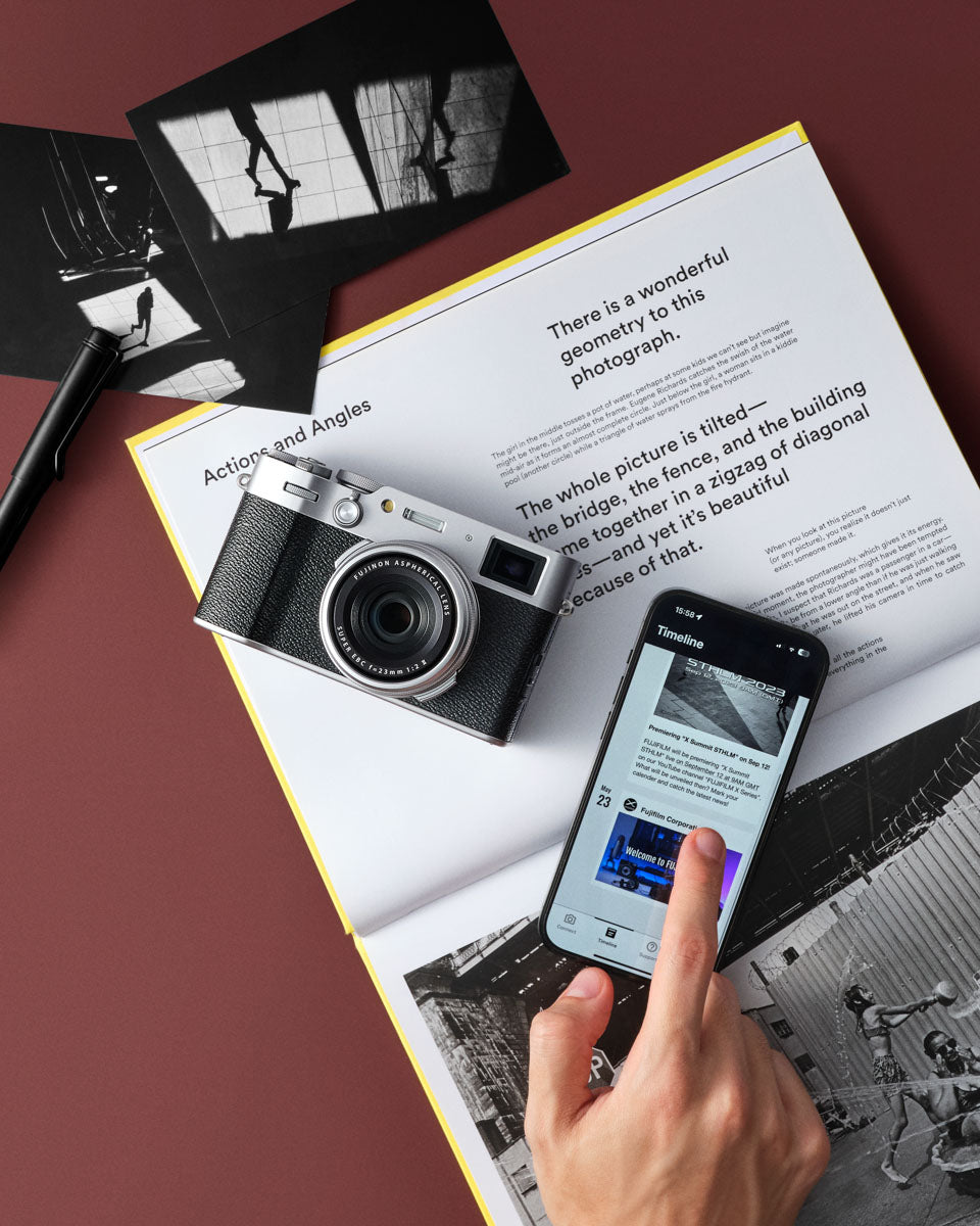 Photo of the camera & phone on a desk