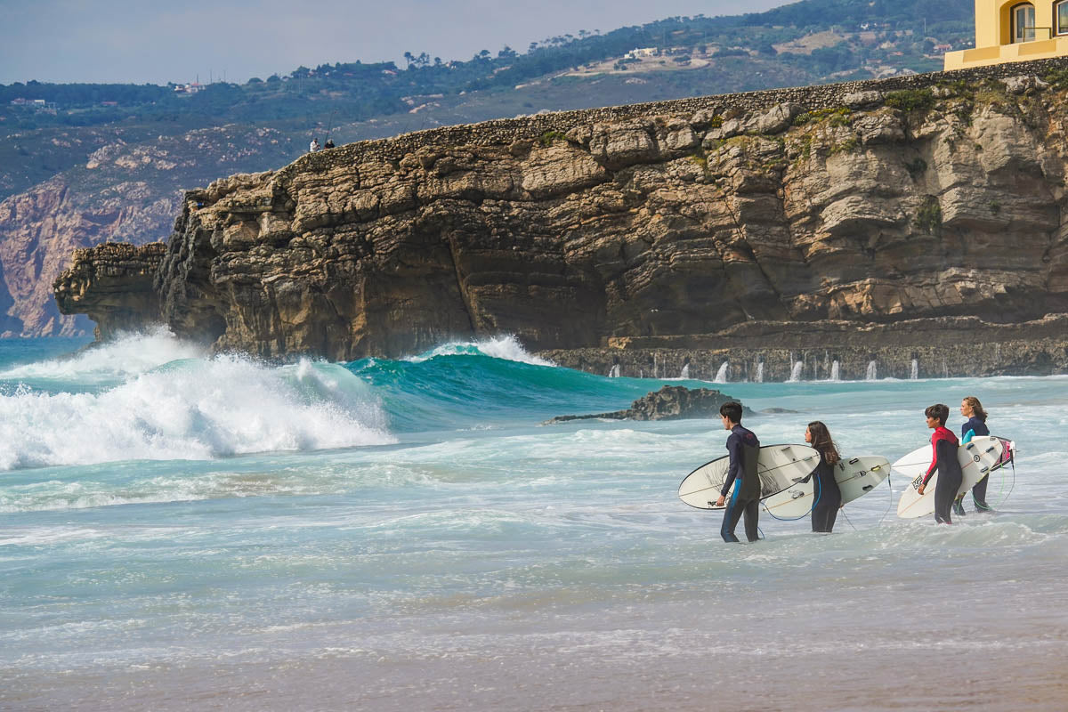 Photo of a surfer and the waves at the beach taken on the Sigma 150-600mm