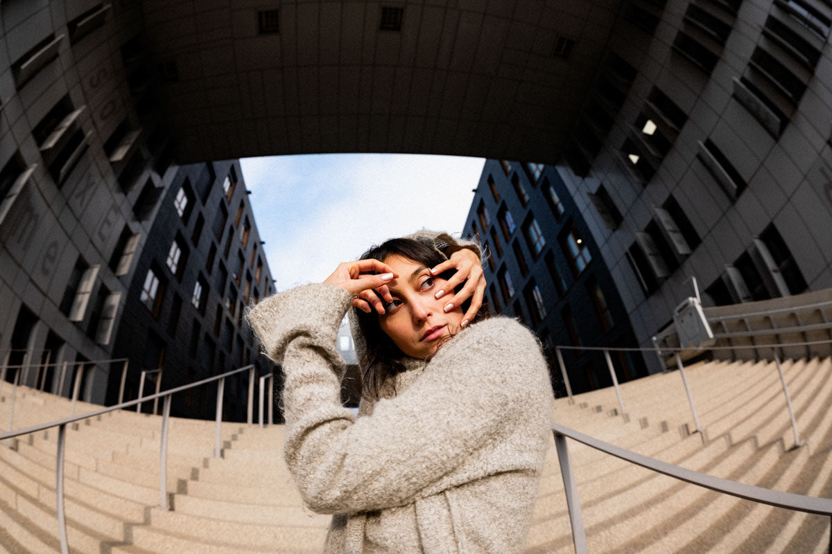 Sample photo taken on the Sigma 15mm f1.4 - Portrait of a lady in an urban setting