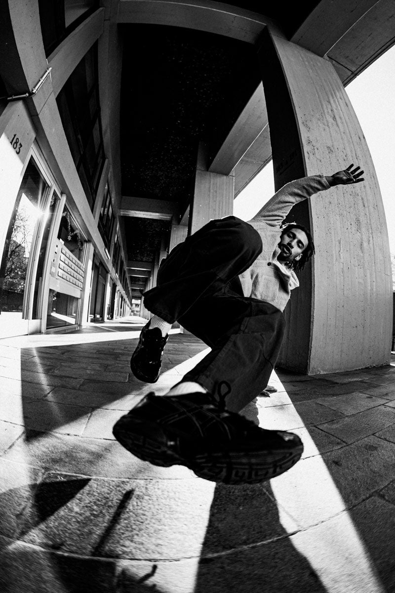 Sample photo taken on the Sigma 15mm f1.4 - Breakdancer in an urban setting / Street Photography