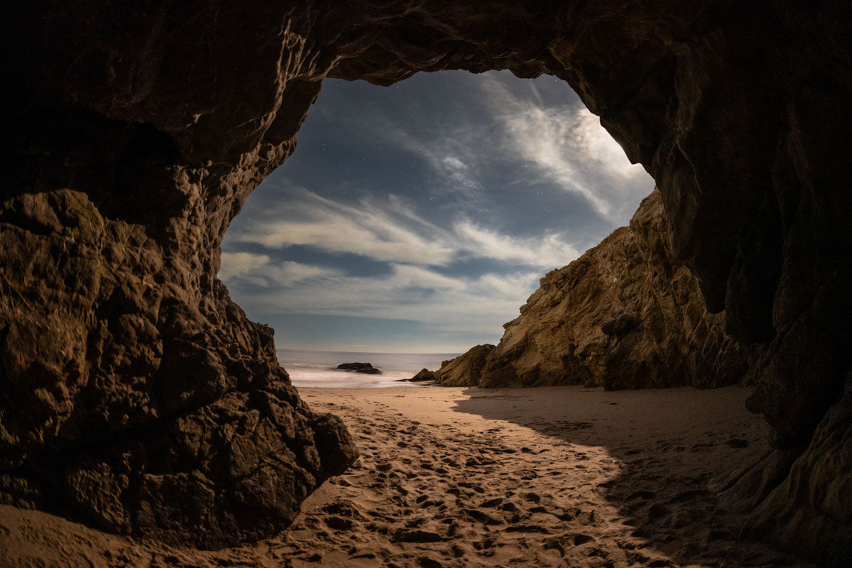 Sample photo taken on the Sigma 15mm f1.4 - Astrophotography at night on the beach in a cave