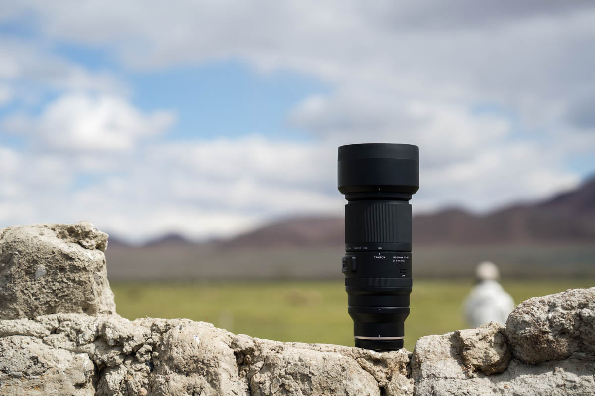 Photo of the lens on a stone wall in a mountainous region