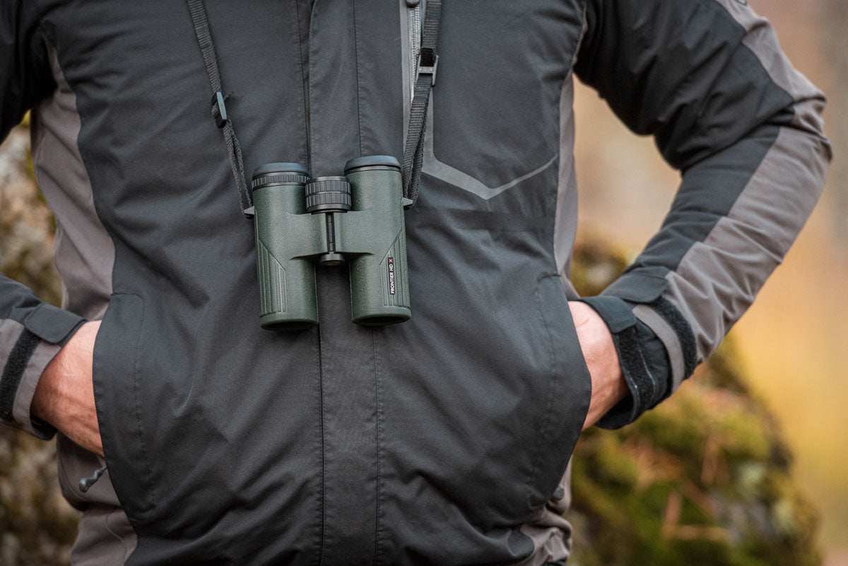 Lifestyle photo of the binocular in use, in the field
