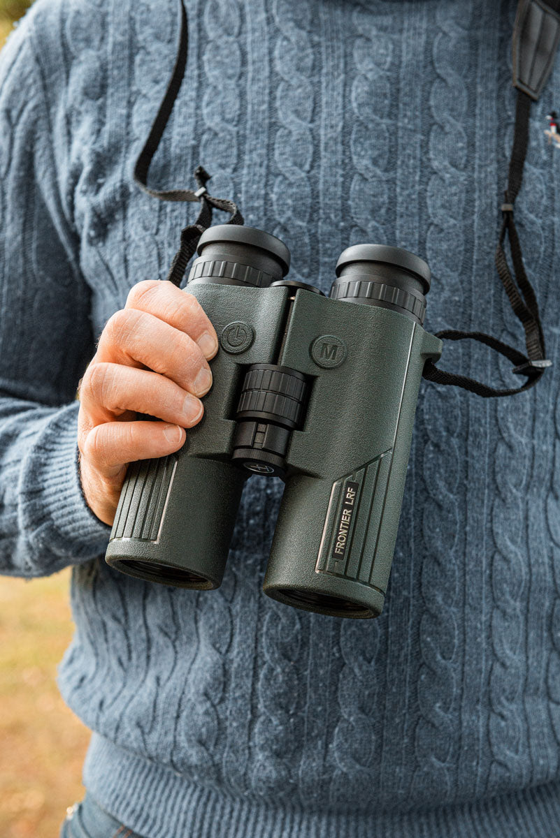 Lifestyle photo of the binocular being held in hand