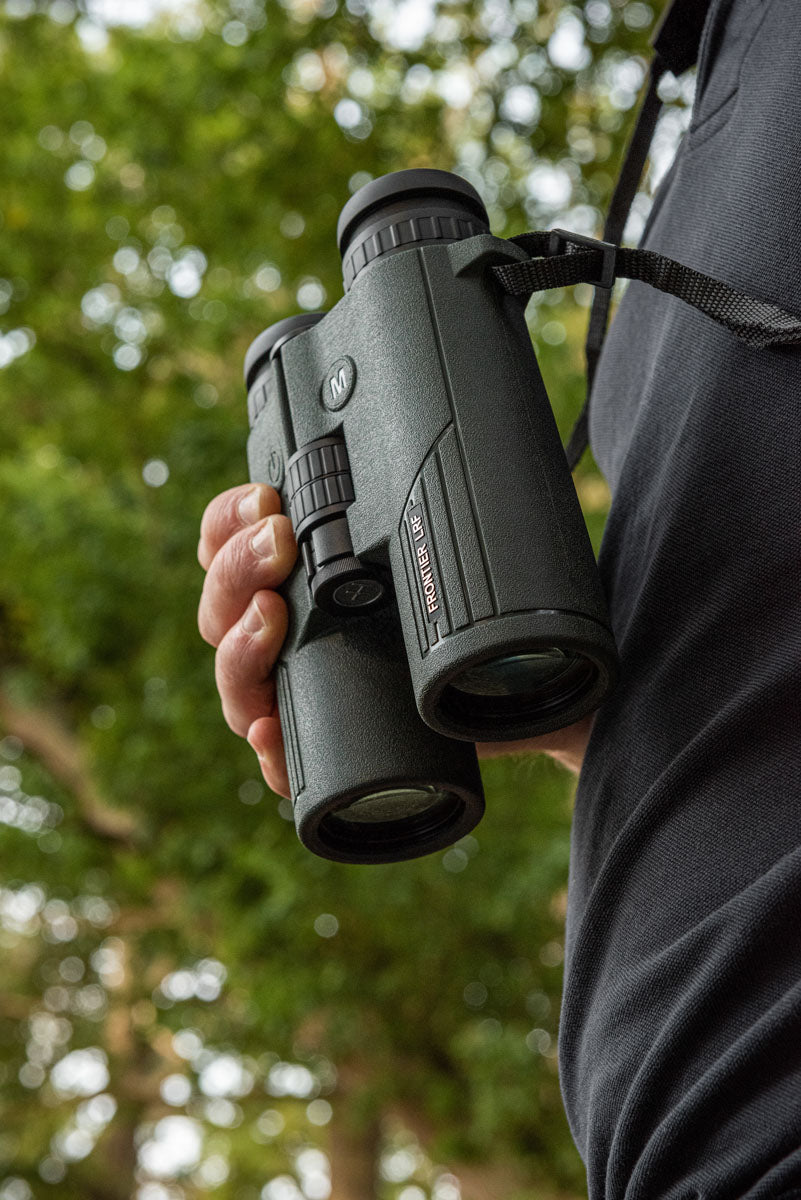 Another lifestyle photo of the binoculars being used in the field