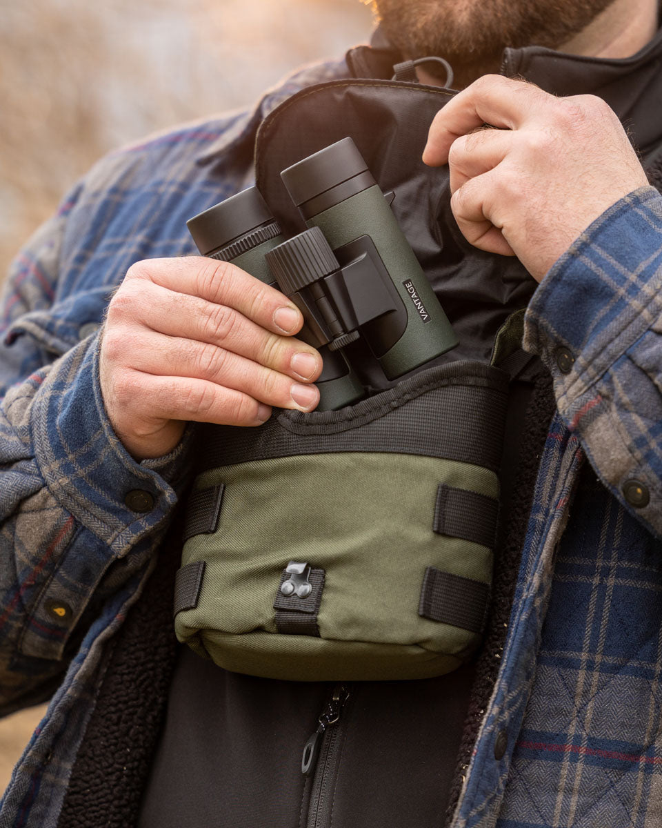 Lifestyle shot of the binoculars being used by a person out in the woodland