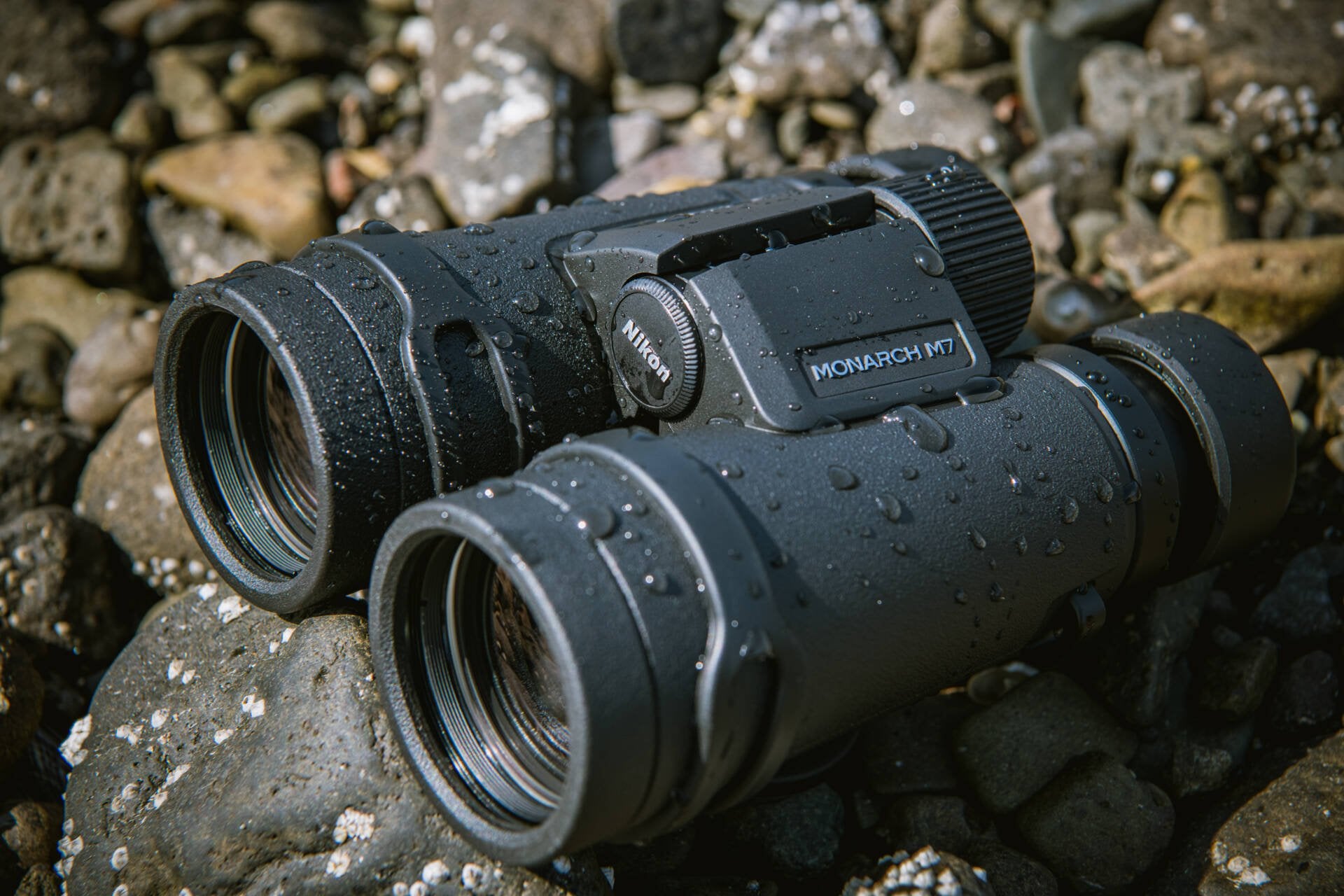 Photo of the binoculars covered in water to illustrate their durability