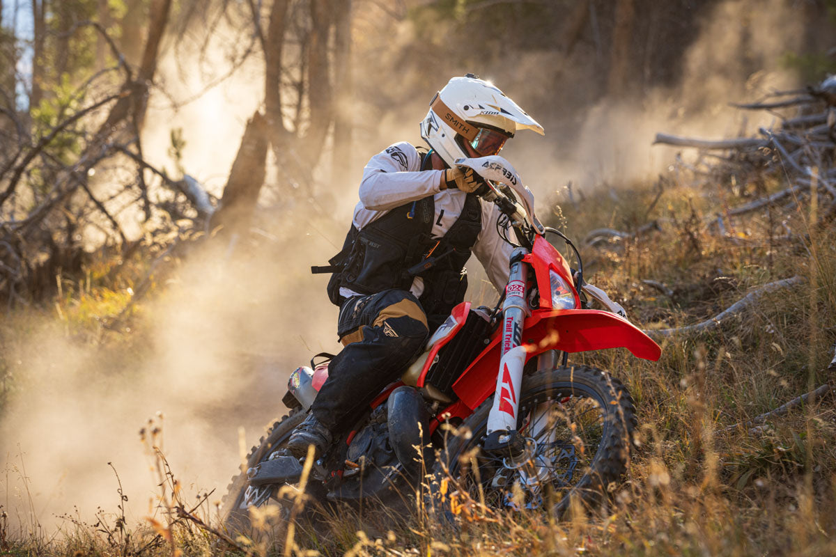 Enduro Motorcycle rider in the forest