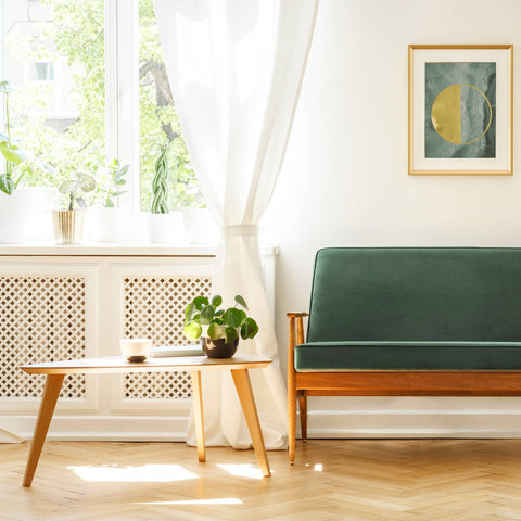 mid-century-inspired-side-table-and-sofa-with-tapered-legs