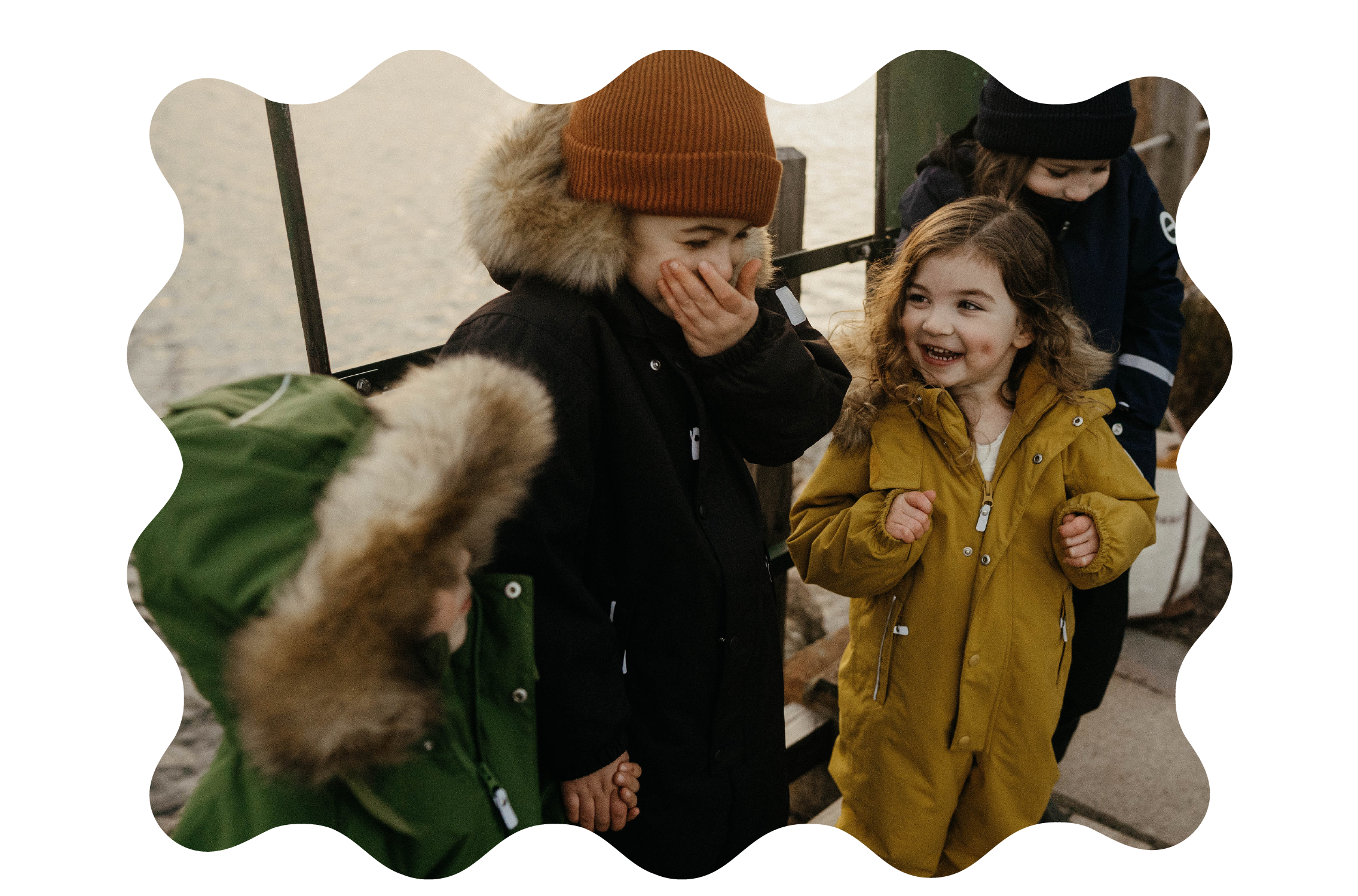 Group shot of kids in Reima Stavanger Winter Playsuits