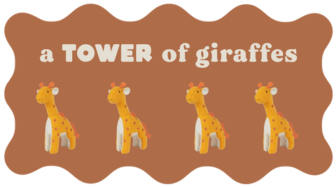 A group of stuffed giraffes from Olli Ella with the title "a tower of giraffes"