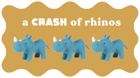 A group of stuffed rhinos from Olli Ella with the title "a CRASH of rhinos"